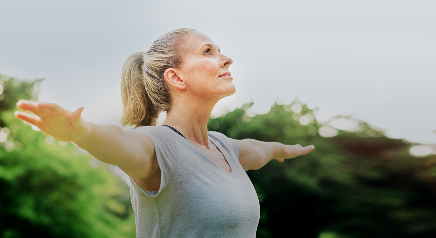 a woman with her arms out