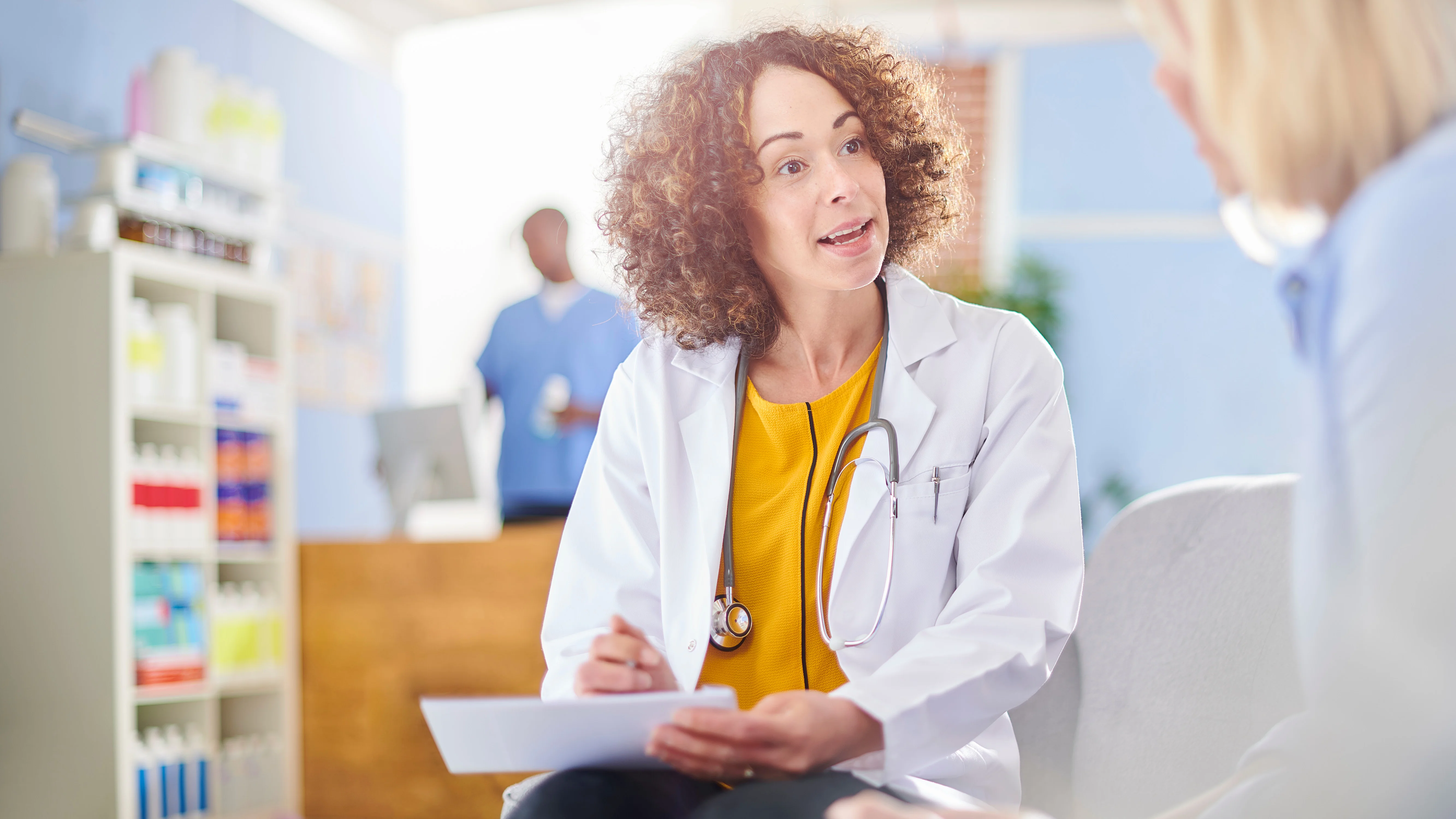 a person in a white coat