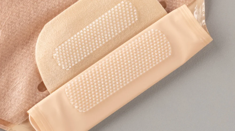 a close-up of Convatec's Invisiclose™ Clipless Tail Closure