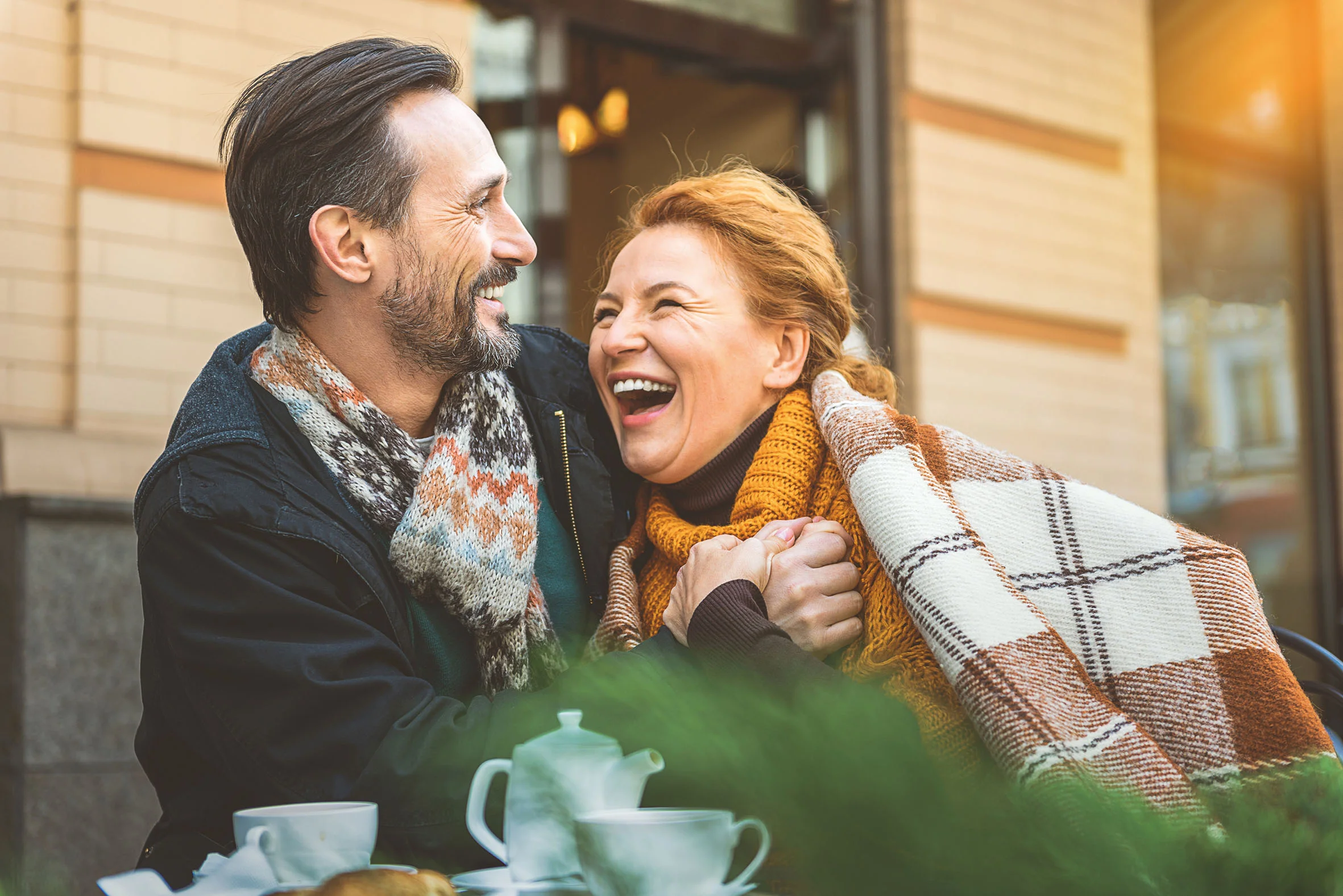 a man and a woman smiling