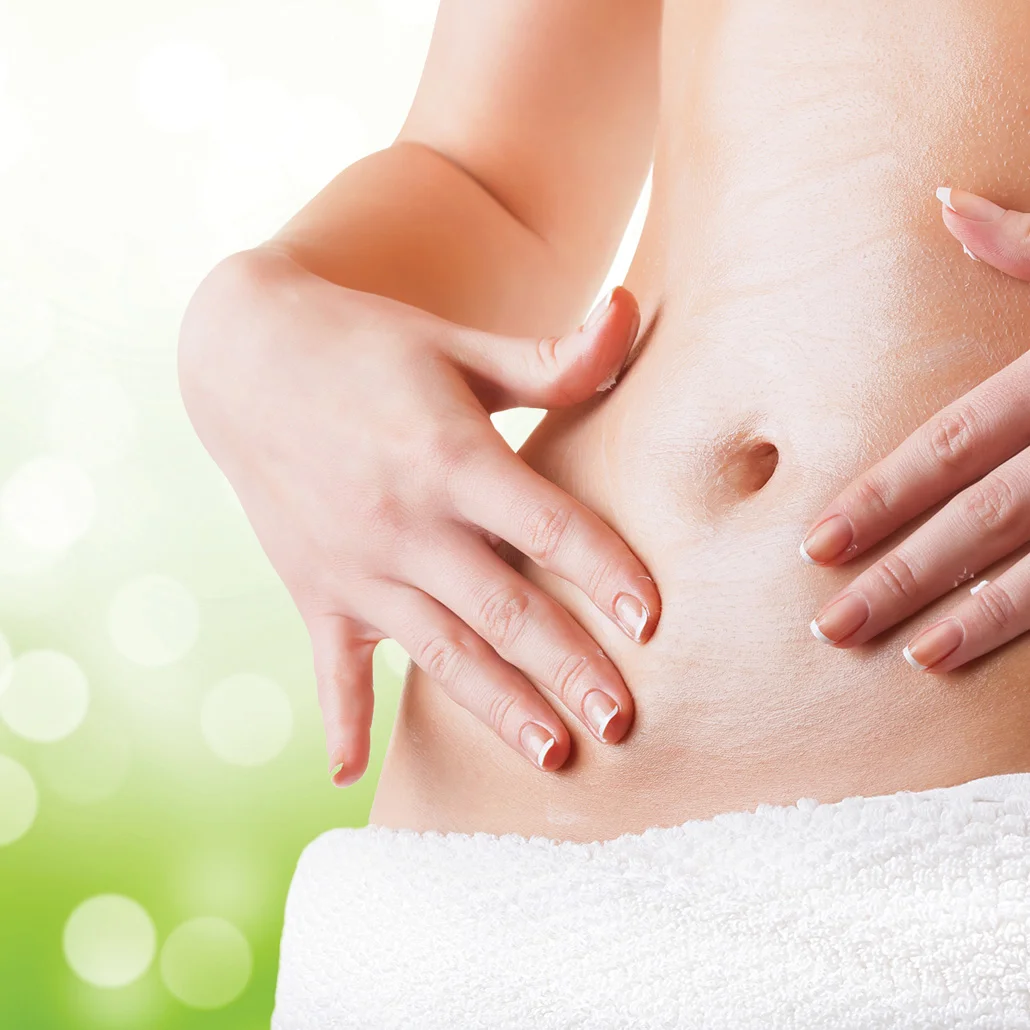 woman touching her stomach