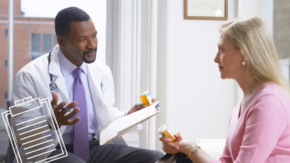 a doctor speaking to a woman